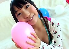 Adorable black haired babe Miho Sugaya plays with big red ball